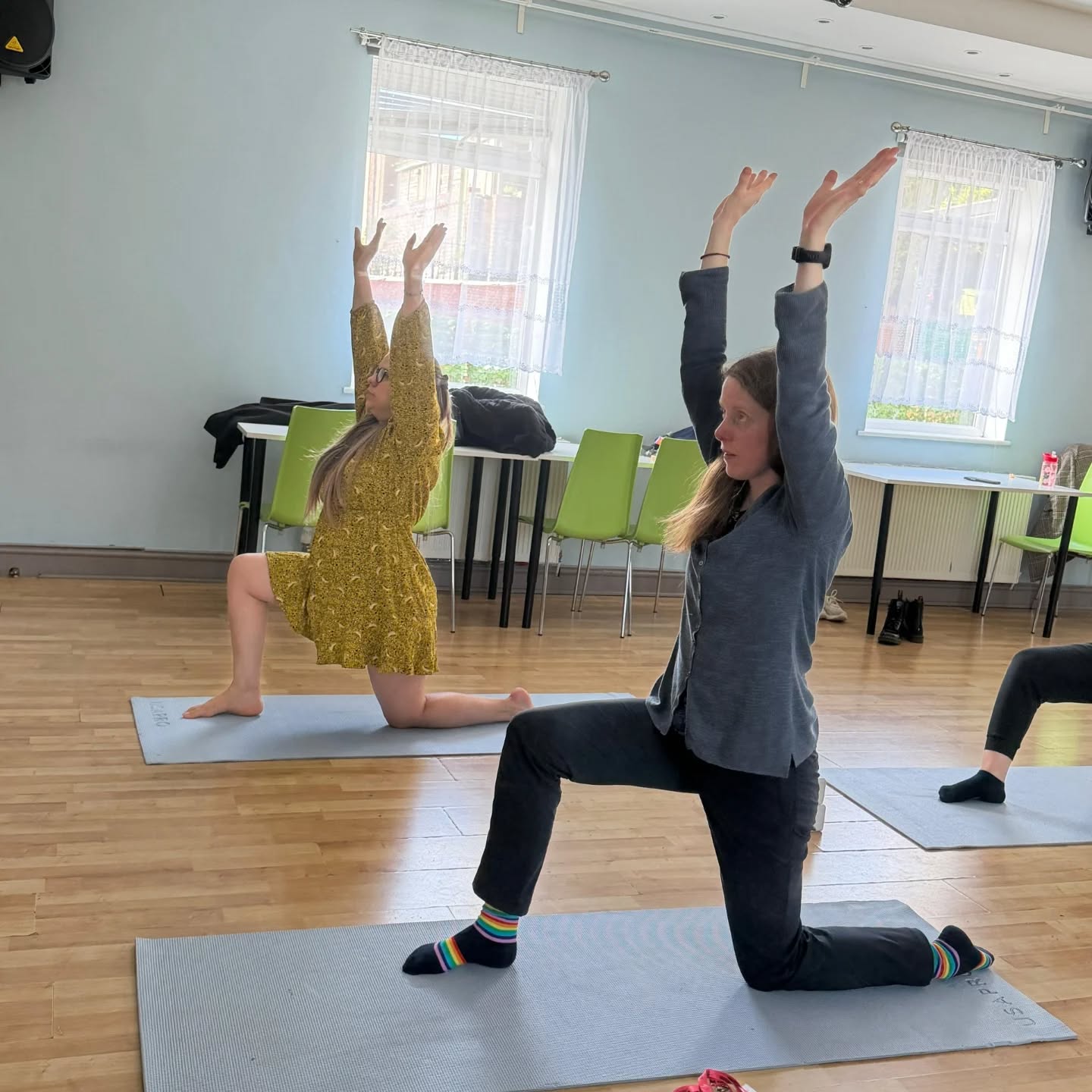 Roots for Change members participating in a yoga class